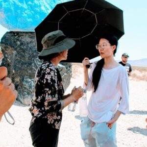 BTS of Suntanned Orange.Peiqi Peng (R) with lead actress Grace Chang.